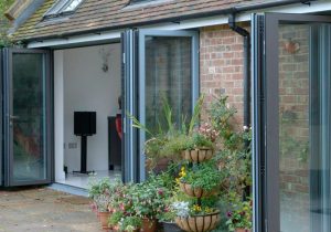 aluminium bi-fold doors grey open