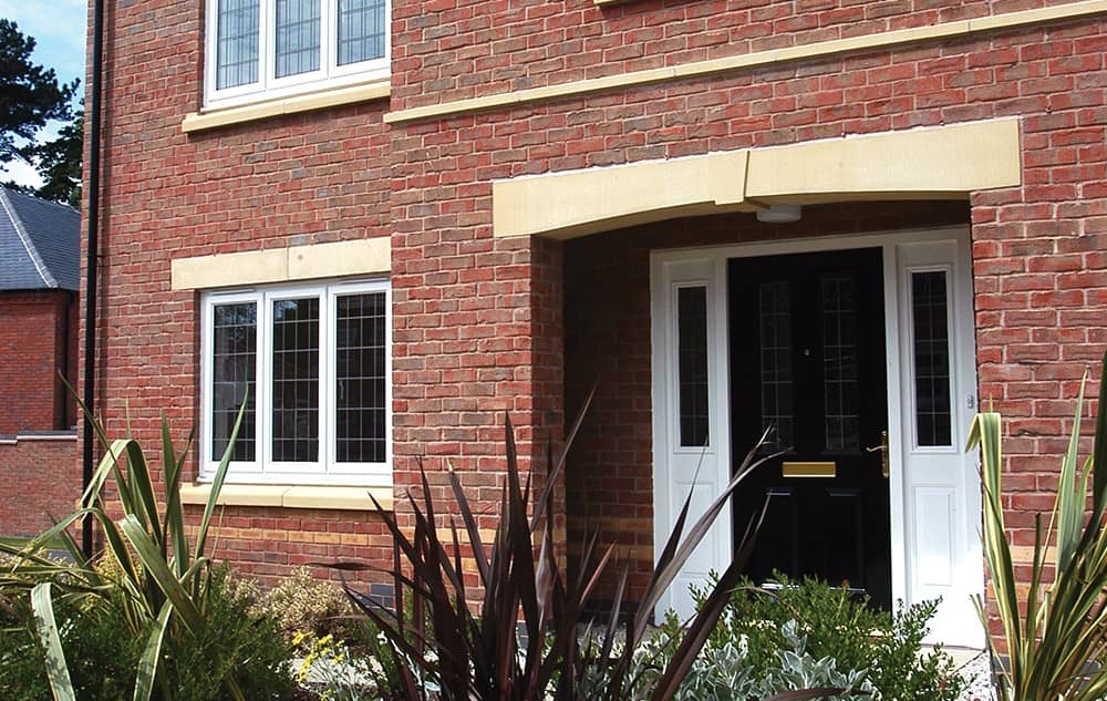 black composite door with white panels