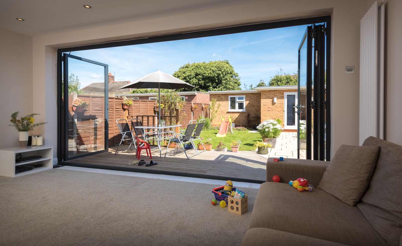 Opened black Origin bifold doors