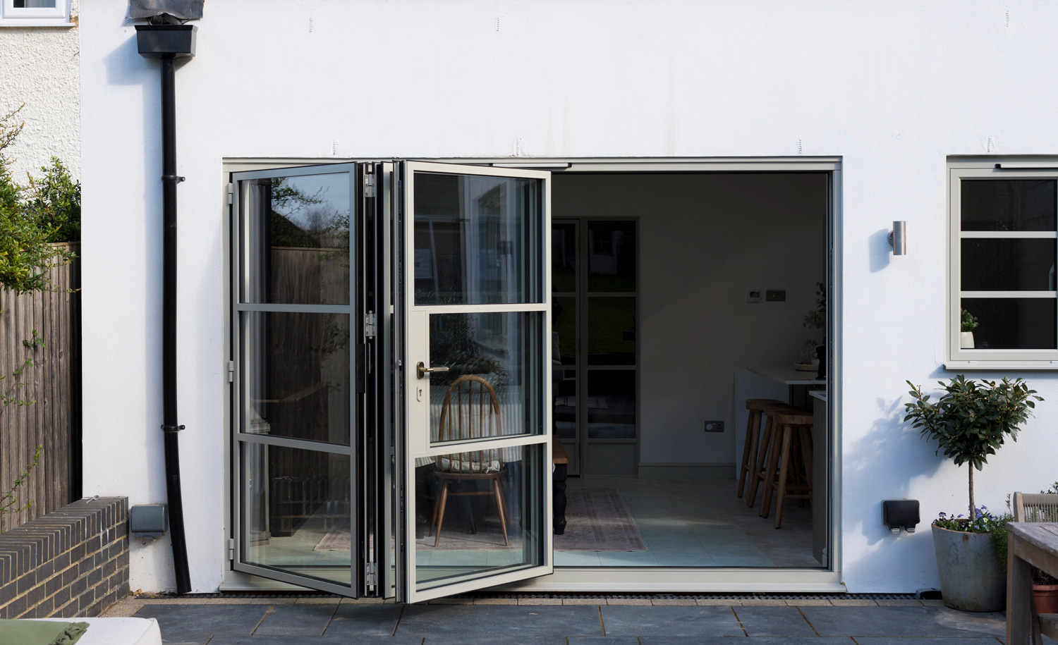 Cream white aluminium bifold doors in London